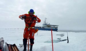 Aleksey Shestov works on the ice during the last leg of the Norwegian Polar Institute's N-ICE 2015 expedition. Credit: Marcel Nicolaus 