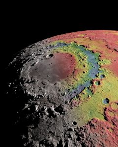 The Moon's Orientale basin is surrounded by distinct right structures. The image shows the basin's gravitational signature (red indicates excess mass, blue indicates mass deficits), which scientists used to reconstruct the formation of the basin and its rings. Ernest Wright, NASA/GSFC Scientific Visualization Studio.)