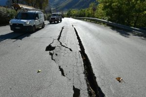  Cracks on the road outside the centre of Norcia, central Italy pictured a day after a 6.5-magnitude earthquake struck on October 30, 2016 . Credit: AFP/Alberto Pizzoli