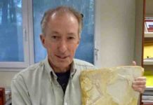 Dr. John Nudds with Archaeopteryx fossil specimen at the European Synchrotron in Grenoble.