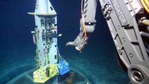 Scientists use the deep-diving robot Jason to collect water samples from oceanic crust at a subseafloor observatory off the coast of Washington. A recent study found that a group of unusual microbes living below the seafloor provides clues to the evolution of life on Earth, and potentially other planets. Credit: Woods Hole Oceanographic Institution, courtesy of University of California, Santa Cruz, US National Science Foundation, ROV Jason dive J2-711, 2013, AT26-03 cruise chief scientist Andrew Fisher