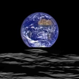 The rising Earth from the perspective of the moon. 
