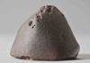 The L6 ordinary chondrite El Médano 128, a 556 g meteorite recovered in the Atacama Desert. Photo courtesy CCJ-CNRS, P. Groscaux.