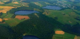 Three water-filled maars in the Eifel, Germany (Gemündener Maar, Weinfelder Maar, Schalkenmehrener Maar). Created by volcanic activity, maars are also found in other parts of Europe and on other continents, but Eifel-Maars are the classic example worldwide.