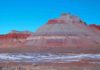 The colorful banded Tepees are part of the Blue Mesa Member, a geological feature about 220 million to 225 million years old in the Chinle Formation in Petrified Forest National Park in Arizona. Credit: NPS
