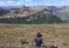Karen Heeter overlooks Yellowstone from Republic Pass on a tree coring excursion in July 2018. Credit: Grant L. Harley