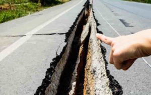 Stick-slip events in the earth cause damage like this, but limited data from these relatively rare earthquakes makes them difficult to model with machine learning. Transfer learning may provide a path to understanding when such deep faults slip. Credit: Dreamstime 