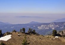 Mountains and winds confound particle distribution
