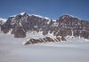 Why is Greenland covered in ice?