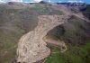 Vibrations make large landslides flow like fluid