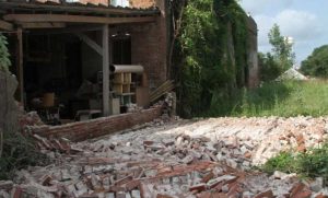 This wall collapsed in Timpson, Texas, following a 4.8 magnitude earthquake in 2012. A new satellite study confirms the temblor was induced by injection of large volumes of wastewater from oil and gas activities. Credit: East Texas Press 