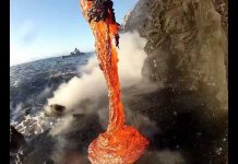 Close footage of Lava entering the ocean