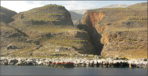 Flight of marine terraces on the south coastline of Crete, Greece, eastern Mediterranean. The lower prominent paleoshoreline (indicated by the red-line) records tectonic rock uplift during the 365 AD M>8 earthquake. The higher marine terraces (indicated by the yellow-lines) record cumulative uplift over many earthquake-cycles that occurred during the last 125 thousand years. Credit: V. Mouslopoulou/GFZ