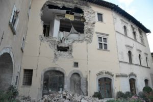 A building in the village of Visso, central Italy, is damaged following twin earthquakes on October 26, 2016 