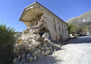 A destroyed house in the village of Pretare, near Arquata del Tronto, Italy, Tuesday, Nov. 1, 2016. Earthquake aftershocks gave central Italy no respite on Tuesday, haunting a region where thousands of people were left homeless and frightened by a massive weekend tremor that razed centuries-old towns. Credit: AP Photo/Sandro Perozzi