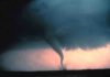 Scientists use seismic waves to measure tornado intensity Tornado with dust and debris cloud forming at surface.