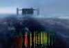 How the Earth stops high-energy neutrinos in their tracks This image shows a visual representation of one of the highest-energy neutrino detections superimposed on a view of the IceCube Lab at the South Pole