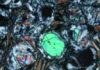 fresh olivine (large green, blue and pink crystals) and glass inclusion (lower left inset)