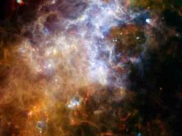 Some of the coldest and darkest dust in space shines brightly in this infrared image from the Herschel Observatory.