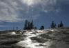 Study reveals structure and origins of glacial polish on Yosemite’s rocks Glacial polish reflects sunlight at Pothole Dome in Yosemite National Park, California.