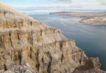 Origins of photosynthesis in plants dated to 1.25 billion years ago The Angmaat Formation above Tremblay Sound on the Baffin Island coast