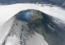Scientists eavesdrop on volcanic rumblings to forecast eruptions Aerial view of Villarica volcano.