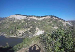 The Stanton Landslide (center middle distance) is over 800 meters across and has left an obvious scar in the hillside above the deposit.