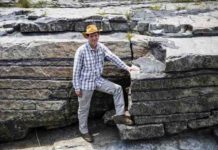 New study reveals the secret of magmas that produce South Africa’s national treasures This is professor Rais Latypov in front of an example of the stratified chromite layers.