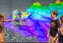 Sub-sea rift spills secrets to seismic probe The Galicia group -- from left, Rice graduate student Nur Schuba, alumnus Ara Alexanian and graduate research assistant Mari Tesi Sanjurjo -- discuss the northwest portion of the 3-D seismic volume at Rice's Visualization Lab.