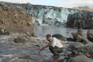 Dr Peter Wynn, Lancaster University, taking a sample in Iceland. Credit: Dr Hugh Tuffen