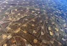 Where water goes after fracking is tied to earthquake risk This is an aerial view of hydraulic fracturing operations across the Jonah field, a large natural gas field in Wyoming.