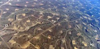This is an aerial view of hydraulic fracturing operations across the Jonah field, a large natural gas field in Wyoming.
