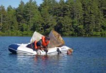 Geoscientists reconstruct ‘eye-opening’ 900-year Northeastern U.S. climate record Doctoral students Daniel Miller, in the water, with Helen Habicht and Benjamin Keisling, handle two recaptured sediment traps from an unusually deep lake in central Maine, where they collected 136 sediment samples spanning the 900-year time span to reconstruct the longest and highest-resolution climate record for the Northeastern United States to date.
