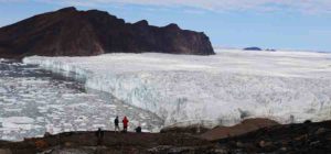 The calving front of Bowdoin Glacier in northwestern Greenland, where icebergs are discharged and ice under the water melts.