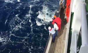 Scientists and shipboard crew await the arrival of a new sediment core onboard research vessel RV Sonne in 2016. 