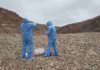 Atacama Desert microbes may hold clues to life on Mars Picture taken at one of the sites inspected in the Coastal Range of the Atacama Desert. On this picture Professor Azua-Bustos and González-Silva are donning sterile suites and using sterile collecting materials in order to avoid the contamination of the sites studied. Credit: Margarita Azua