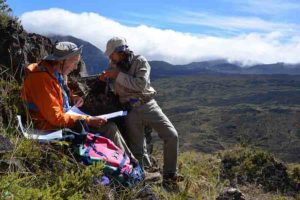 Study co-author Rob Coe and Trevor Duarte orienting cores from a lava flow site recording the Matuyama-Brunhes magnetic polarity reversal in Haleakala National Park, Hawaii, in 2015