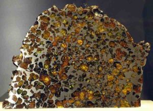 An example of a Pallasite meteorite (from the Esquel fall) on display in the Vale Inco Limited Gallery of Minerals at the Royal Ontario Museum.