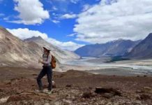 As part of MISTI-India, Megan Guenther, a junior in EAPS, records field notes about the landscape of the Kohistan-Ladakh region of the Himalayas in northern India. Credit: Craig Martin