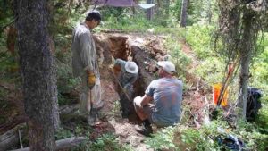 The excavation of trench B at the Leigh Lake site. Shown in the photo (from left to right) are Glenn Thackray, Cooper Brossy, and Darren Zellman. Credit: Mark Zellman