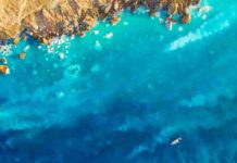 Life under extreme conditions at hot springs in the ocean Aerial view of the acidic hot springs in the shallow water of the Taiwanese Kueishantao volcanic island, visible through the whitish discoloration of the sea water by sulphur. Credit: Mario Lebrato, Uni Kiel