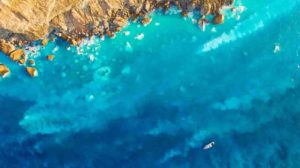 Aerial view of the acidic hot springs in the shallow water of the Taiwanese Kueishantao volcanic island, visible through the whitish discoloration of the sea water by sulphur. Credit: Mario Lebrato, Uni Kiel