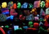 Fluorescence : Why Minerals Fluoresce? Collection of various fluorescent minerals under ultraviolet UV-A, UV-B and UV-C light. Chemicals in the rocks absorb the ultraviolet light and emit visible light of various colors, a process called fluorescence. Credit: Hannes Grobe/AWI