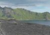‘Fossil earthquakes’ offer new insight into seismic activity deep below Earth’s surface The grey line in the rock, running from the foreground away under the boulder towards the mountains, is one of the shear zones from the study area. Credit: Lucy Campbell