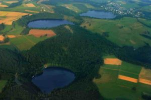 Three water-filled maars, created by volcanic eruptions, in Germany’s Eifel region. Credit: Martin Schildgen/Wikimedia Commons