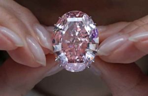  The Pink Star diamond, which fetched the highest price ever for a jewel offered at auction, is displayed at Sotheby's in Hong Kong on March 29. Credit: Vincent Yu/AP 