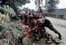 Unusually shallow earthquake ruptures in Chinese fracking field Soldiers remove bricks from the road after earthquake in Rongxian county on 25 February 2019. | Credit: IC