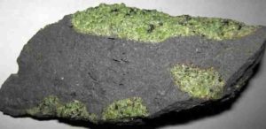 Chunks of exotic green rocks from the mantle erupted from the San Carlos Volcanic Field, Arizona. Credit: James St John