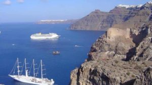 The cliffs of the volcanic island of Santorini showing the layers of deposits from past volcanic eruptions. Credit: co-author Dr. Ralf Gertisser (Keele University). 