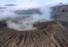 A journey into an Alaskan volcano The rim of Cone D—inside the Okmok Volcano caldera—with the blue lake in the background. Credit: Nick Frearson
